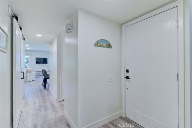 3365 Punta Alta Unit 2F, Laguna Woods, CA 92637 - corridor with light wood-type flooring and recessed lighting