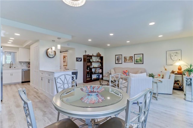 3365 Punta Alta Unit 2F, Laguna Woods, CA 92637 - dining area featuring light wood-type flooring and recessed lighting