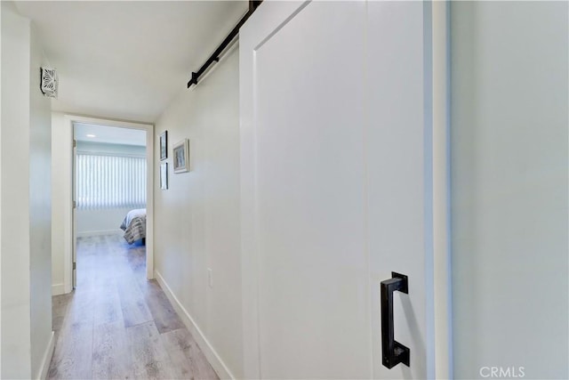 3365 Punta Alta Unit 2F, Laguna Woods, CA 92637 - corridor featuring light wood finished floors and baseboards