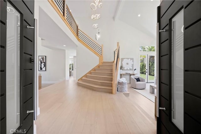 24876 Avenida Avalon, Laguna Hills, CA 92653 - entryway featuring high vaulted ceiling, stairway, beam ceiling, light wood-style floors, and recessed lighting