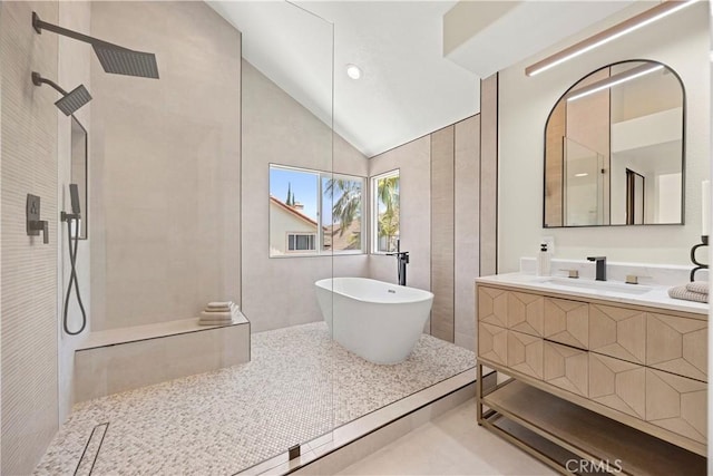 24876 Avenida Avalon, Laguna Hills, CA 92653 - full bath featuring walk in shower, a freestanding tub, vanity, lofted ceiling, and recessed lighting