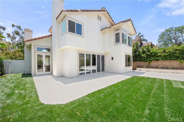 24876 Avenida Avalon, Laguna Hills, CA 92653 - rear view of house featuring a chimney, stucco siding, french doors, a patio, and a gate