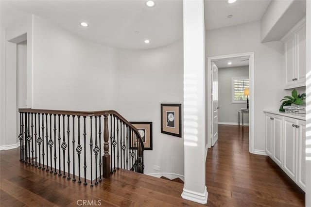 2886 Muir Trail Dr, Fullerton, CA 92833 - corridor with an upstairs landing, dark wood finished floors, and recessed lighting