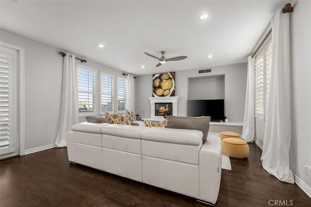 2886 Muir Trail Dr, Fullerton, CA 92833 - living area featuring a glass covered fireplace, dark wood-type flooring, ceiling fan, and recessed lighting