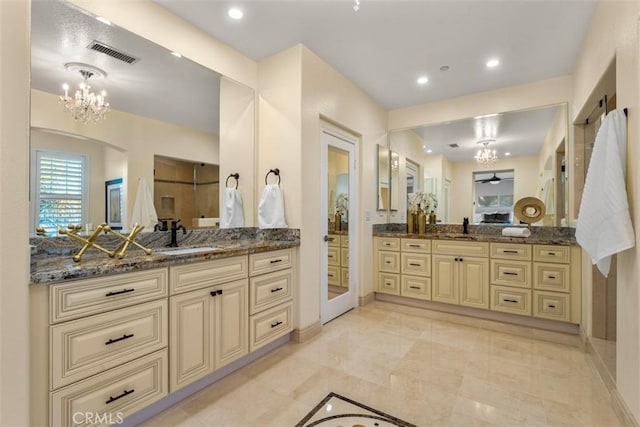 2886 Muir Trail Dr, Fullerton, CA 92833 - full bath featuring a chandelier, two vanities, and recessed lighting
