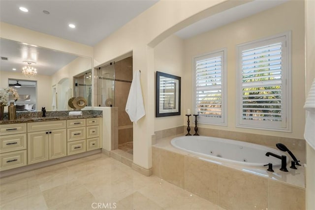 2886 Muir Trail Dr, Fullerton, CA 92833 - bathroom with a shower stall, a tub with jets, vanity, and recessed lighting