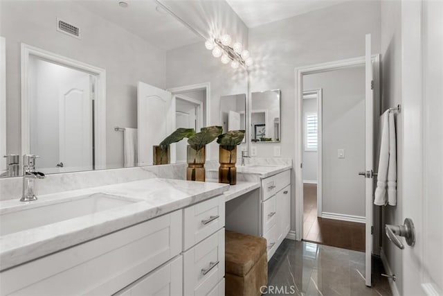 2886 Muir Trail Dr, Fullerton, CA 92833 - bathroom with double vanity and baseboards