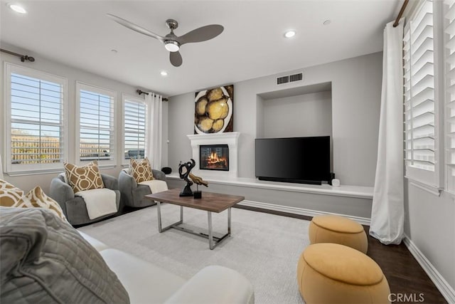 2886 Muir Trail Dr, Fullerton, CA 92833 - living area featuring a ceiling fan, wood finished floors, recessed lighting, and a glass covered fireplace