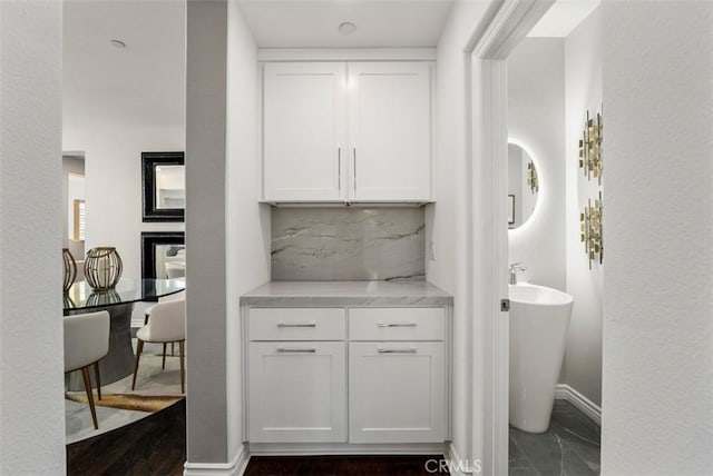 2886 Muir Trail Dr, Fullerton, CA 92833 - bathroom featuring backsplash and marble look tile flooring