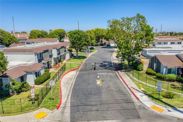 8515 Edgebrook Dr, Garden Grove, CA 92844 - view of asphalt street with traffic signs, curbs, sidewalks, and a residential view