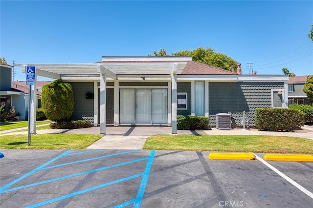 8515 Edgebrook Dr, Garden Grove, CA 92844 - view of front of house with uncovered parking and a front lawn