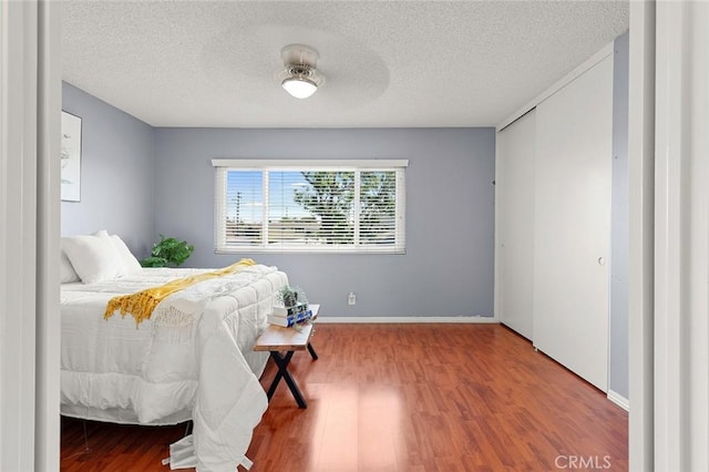 8515 Edgebrook Dr, Garden Grove, CA 92844 - bedroom with wood finished floors and a textured ceiling