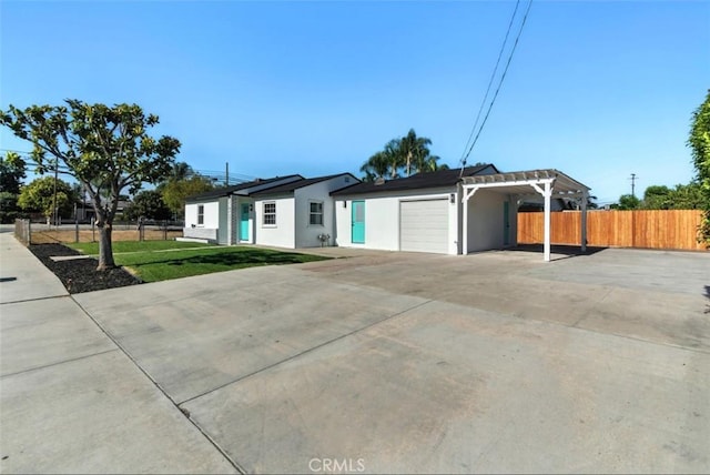 3839 Riverside Dr, Chino, CA 91710 - ranch-style home with driveway, an attached garage, and stucco siding