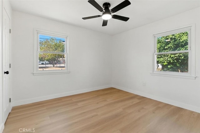 3839 Riverside Dr, Chino, CA 91710 - unfurnished room with healthy amount of natural light, light wood finished floors, and ceiling fan