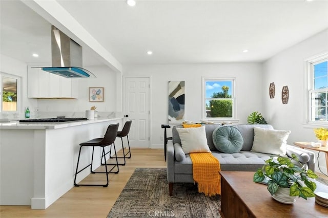 3839 Riverside Dr, Chino, CA 91710 - living room with light wood-style floors and recessed lighting