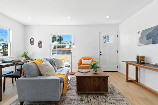 3839 Riverside Dr, Chino, CA 91710 - living area with plenty of natural light, light wood finished floors, and recessed lighting