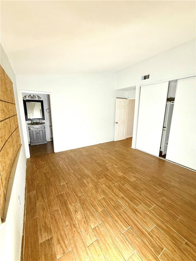 24423 Dunlavy Ct, Moreno Valley, CA 92557 - unfurnished room with wood finished floors