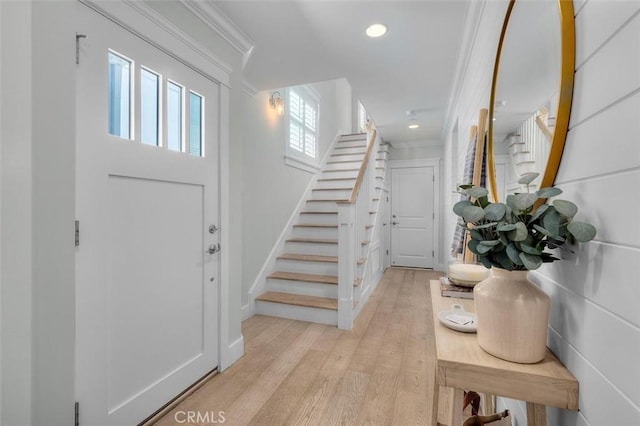 1605 Steinhart Ave, Redondo Beach, CA 90278 - foyer featuring stairway, light wood finished floors, crown molding, and recessed lighting
