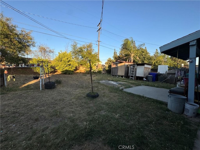 629 S Sage Ave, Rialto, CA 92376 - view of green lawn with a shed