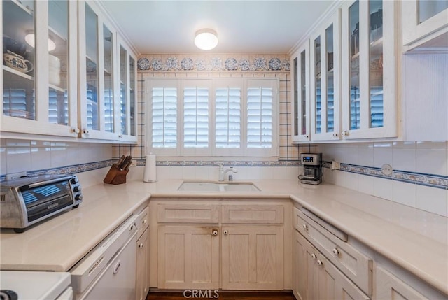 3115 Merrill Dr Unit 59, Torrance, CA 90503 - kitchen featuring white dishwasher, backsplash, and light countertops