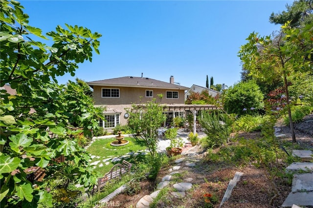 18911 Crimson Cir, Huntington Beach, CA 92646 - back of property featuring stucco siding, a patio, and a pergola