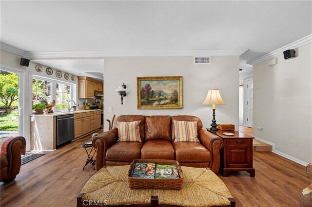 18911 Crimson Cir, Huntington Beach, CA 92646 - living area featuring ornamental molding and light wood-type flooring