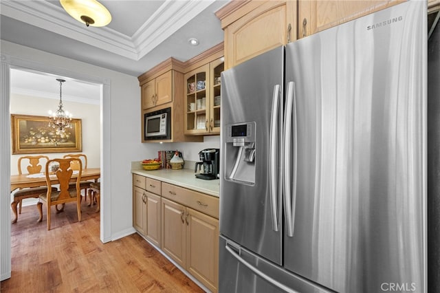 18911 Crimson Cir, Huntington Beach, CA 92646 - kitchen featuring stainless steel refrigerator with ice dispenser, crown molding, light wood-style flooring, glass insert cabinets, and built in microwave