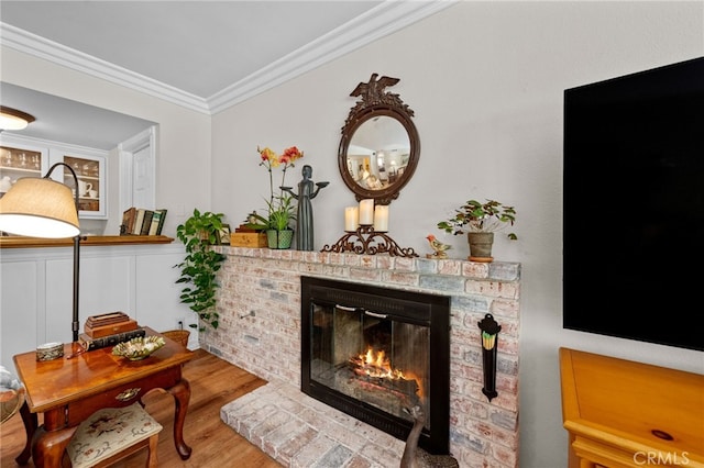 18911 Crimson Cir, Huntington Beach, CA 92646 - living area with a brick fireplace, ornamental molding, and wood finished floors
