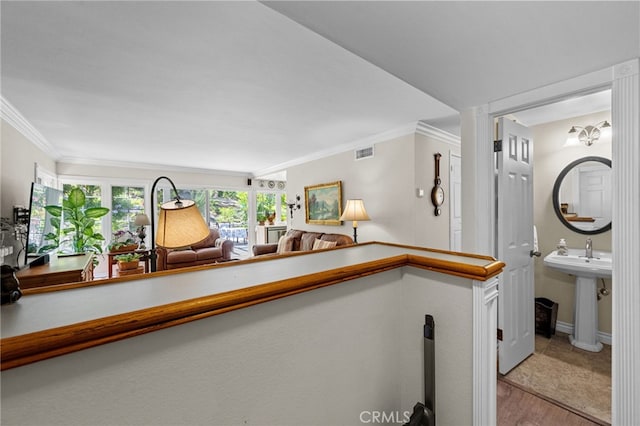 18911 Crimson Cir, Huntington Beach, CA 92646 - interior space with healthy amount of natural light, crown molding, and light wood-style flooring
