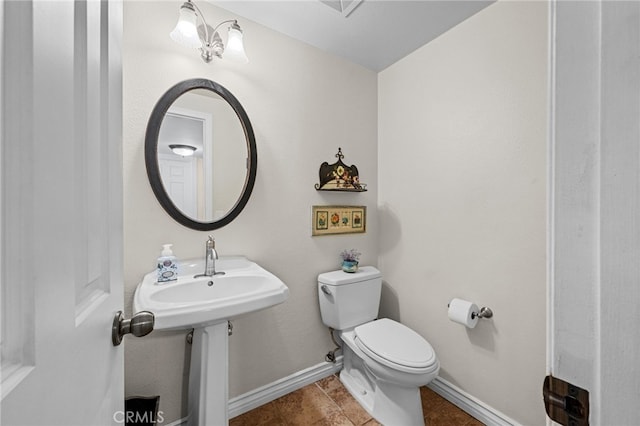 18911 Crimson Cir, Huntington Beach, CA 92646 - bathroom with toilet and baseboards