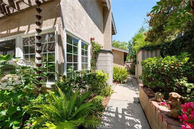 18911 Crimson Cir, Huntington Beach, CA 92646 - view of side of property featuring stucco siding