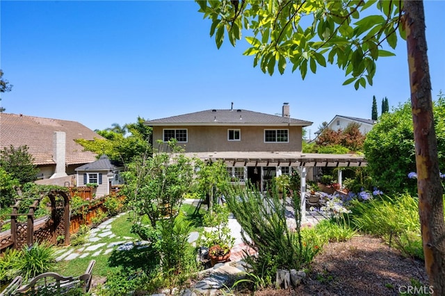 18911 Crimson Cir, Huntington Beach, CA 92646 - back of property with a pergola, stucco siding, and a patio