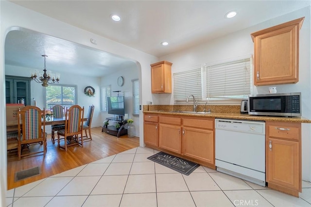 4124 Ivar Ave, Rosemead, CA 91770 - kitchen featuring white dishwasher, stainless steel microwave, arched walkways, a chandelier, and recessed lighting