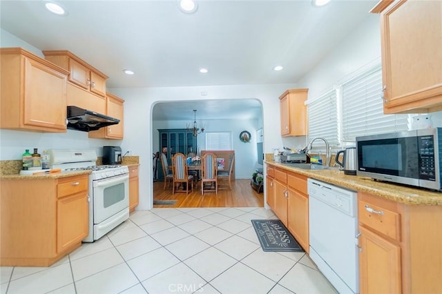 4124 Ivar Ave, Rosemead, CA 91770 - kitchen with white appliances, arched walkways, light brown cabinetry, exhaust hood, and recessed lighting