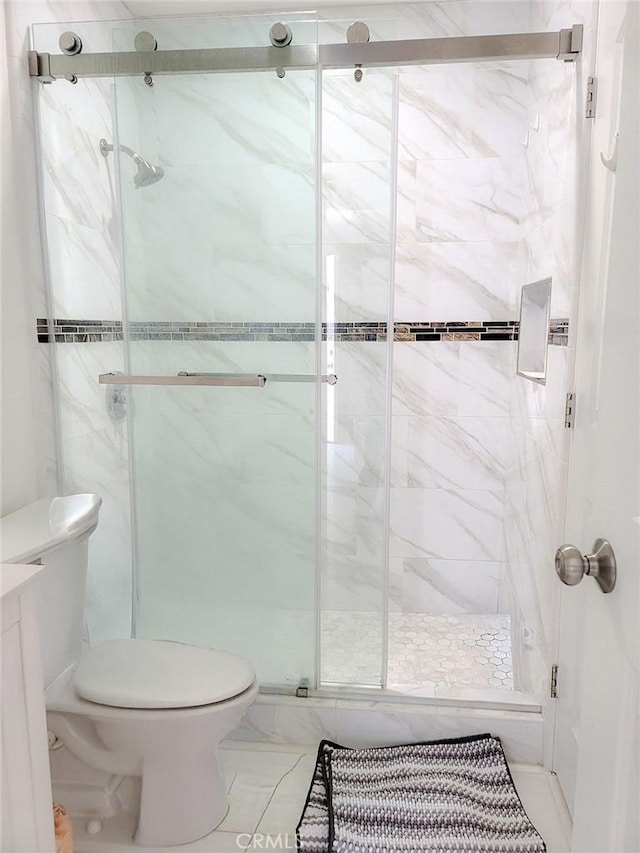 4124 Ivar Ave, Rosemead, CA 91770 - full bath featuring a marble finish shower, marble look tile flooring, and vanity