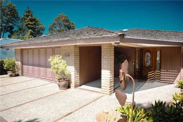 730 Saint James Pl, Newport Beach, CA 92663 - view of front of house with brick siding and roof with shingles