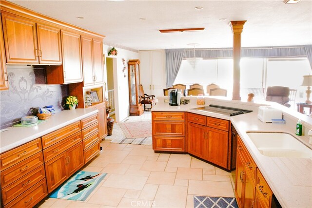 730 Saint James Pl, Newport Beach, CA 92663 - kitchen with light countertops, brown cabinets, and tasteful backsplash