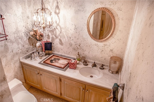 730 Saint James Pl, Newport Beach, CA 92663 - bathroom with vanity, a chandelier, and wallpapered walls