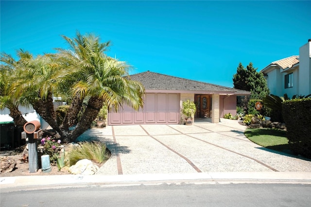 730 Saint James Pl, Newport Beach, CA 92663 - view of front facade featuring a garage and concrete driveway