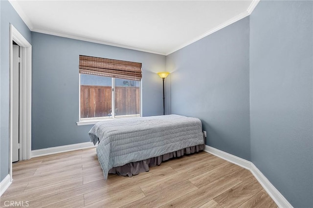 3143 Tourmaline Ln, Palmdale, CA 93550 - bedroom with crown molding and light wood-style floors