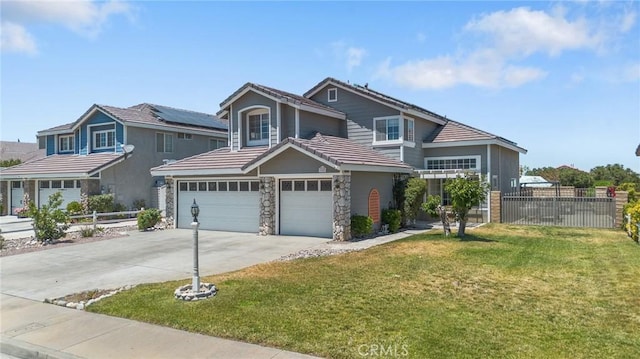 3143 Tourmaline Ln, Palmdale, CA 93550 - traditional-style house featuring concrete driveway, a garage, stone siding, and a tiled roof
