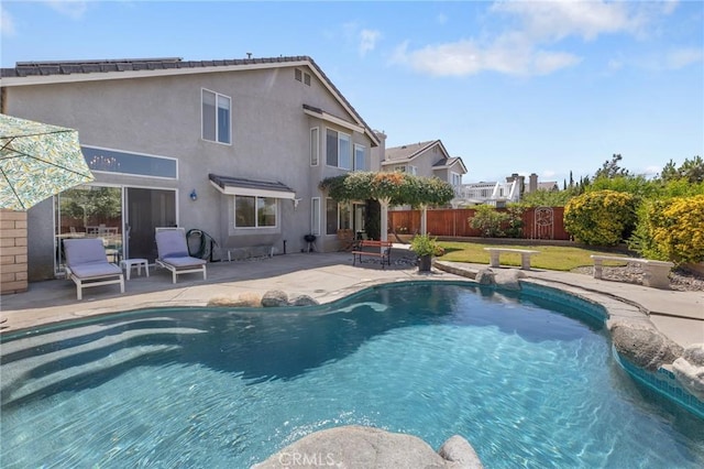 3143 Tourmaline Ln, Palmdale, CA 93550 - view of swimming pool with a patio