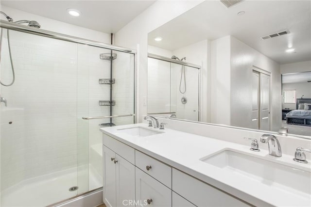 1180 Little Leaf, Calimesa, CA 92320 - bathroom featuring a shower stall, double vanity, ensuite bath, and recessed lighting