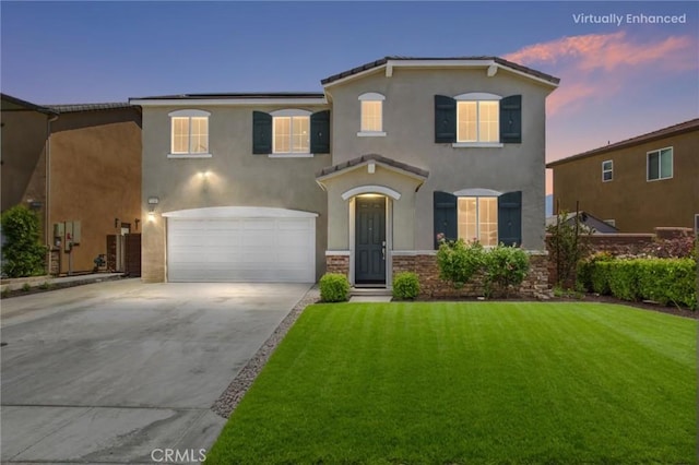 1180 Little Leaf, Calimesa, CA 92320 - view of front facade featuring concrete driveway, a front lawn, an attached garage, and stucco siding