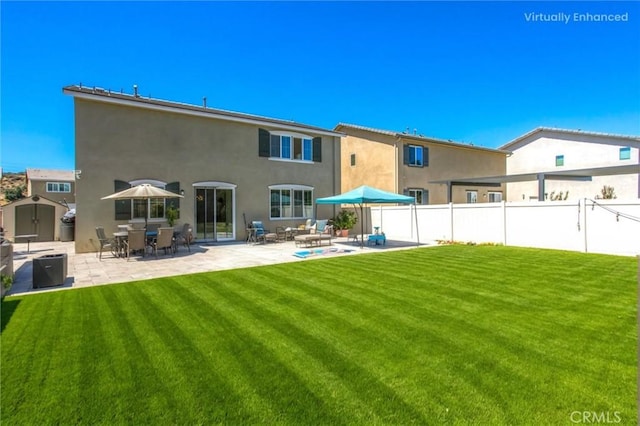 1180 Little Leaf, Calimesa, CA 92320 - rear view of house featuring a storage unit, a patio area, and stucco siding