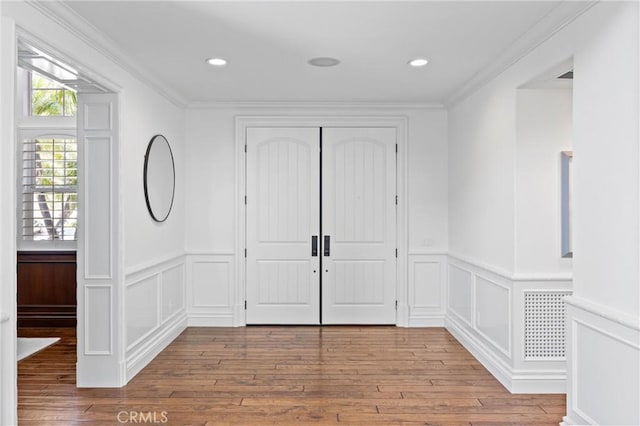 2175 Palmer Pl, Tustin, CA 92782 - entryway featuring wood-type flooring, a decorative wall, a wainscoted wall, and recessed lighting