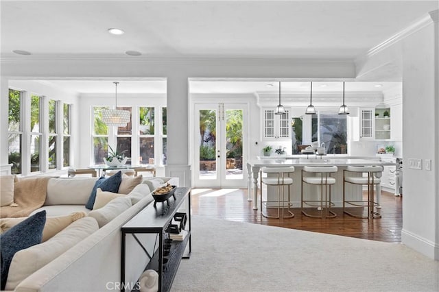 2175 Palmer Pl, Tustin, CA 92782 - living area with ornamental molding, dark wood-type flooring, french doors, and recessed lighting