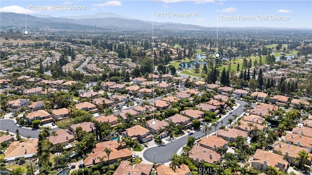 2175 Palmer Pl, Tustin, CA 92782 - aerial view of property's location with nearby suburban area and a mountain backdrop