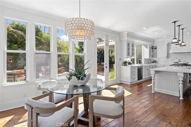 2175 Palmer Pl, Tustin, CA 92782 - dining space featuring a chandelier, crown molding, dark wood-style floors, and recessed lighting