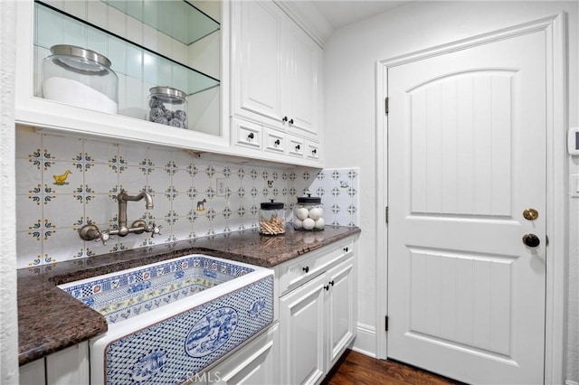 2175 Palmer Pl, Tustin, CA 92782 - bar with backsplash and dark wood-style flooring